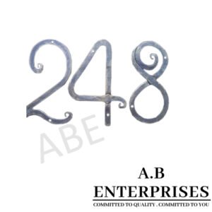 Handcrafted numeral in handforged iron with natural patina finish by A.B. Enterprises, India.
