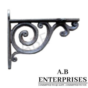 Handcrafted cast iron shelf bracket by A.B. Enterprises – strong and decorative wall support for homes, offices, and interiors.